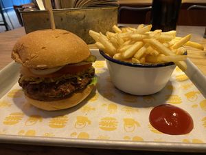 Impossible burger and fries ($28, plus extra $2 for vegan cheese)  at The World Bar and Resturant in Queenstown