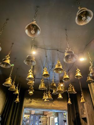 ceiling with bells at Agni Food in Vilnius