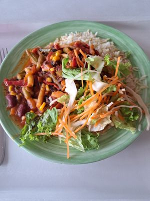 colourful bean chilli additional long grain rice and marinated leaf salads at Mensa UniCampus Magdeburg in Magdeburg
