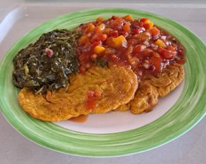 Chickpea pancakes with peach and tomato salsa and sesame leaf spinach at Mensa UniCampus Magdeburg in Magdeburg