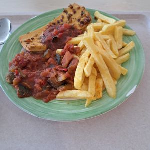 oven tofu in garlic-chilli herb marinade with french fries and ratatouille at Mensa UniCampus Magdeburg in Magdeburg