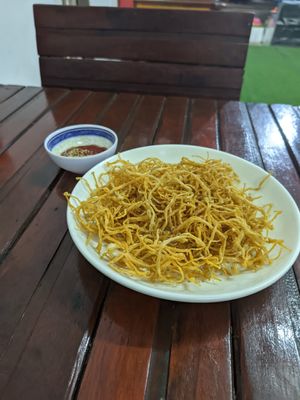 Fried needle mushrooms at Kaun Im Yok Vegan Restaurant - H&H in Vang Vieng