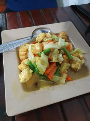 Stir-fry tofu curry at Kaun Im Yok Vegan Restaurant - H&H in Vang Vieng