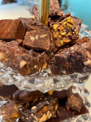 Amandine- vegan almond butter, pistachios, figs, cocoa nibs, dark chocolate at MINA Handmade Chocolates in Sint-genesius-rode