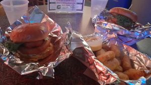 Veggie burger + Onion Rings (vegetarian) at Art Bar in Columbia