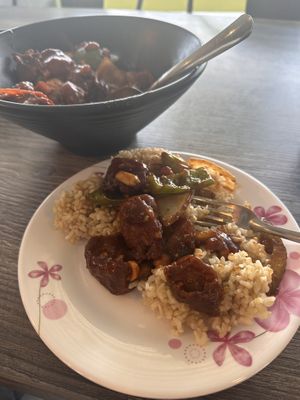 King Pao “Chicken” with Brown Rice  at Sipz Fusion Cafe - Clairemont Mesa in San Diego