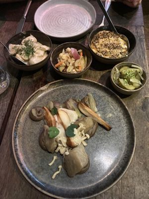 Celeriac main with pickles, beluga lentils, cucumber aide and potatoes   at BRLO in Berlin