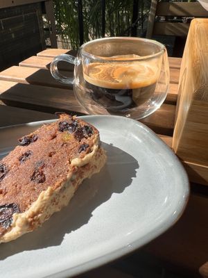 Cake of the day with araku black coffee at Cafe Graze - Plant Based Kitchen by Natureville in Bangalore