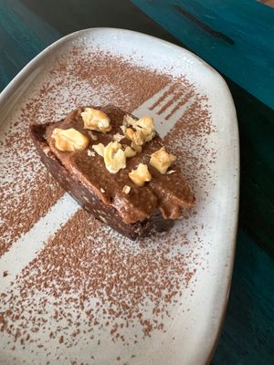 Raw brownie- sweetened with dates only. at Cafe Graze - Plant Based Kitchen by Natureville in Bangalore