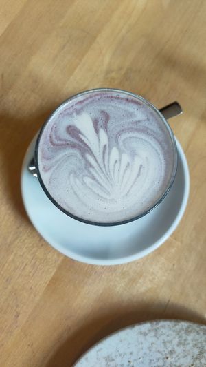 Purple chai with oat milk  at Konditorei Goetheplatz Café in Bad Berleburg