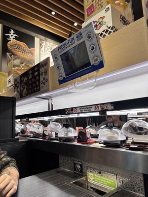 conveyor belt   at Kura in Orlando