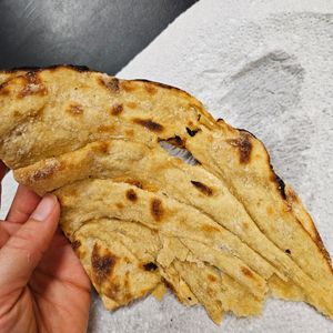 Aloo paratha bread, vegan at Delhi6 Indian Kitchen in Highland Village