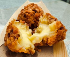 Texture of cheesy potato balls at Water Drop Teahouse 滴水坊 in Northeast Singapore