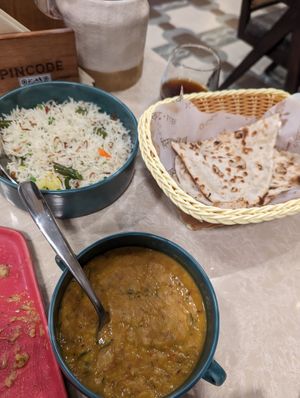 Roti, dal fry and pilau rice at Pincode in Dubai