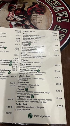 menu (2/4). Some leaf-labelled items are vegan.  at Sonora Sport Tavern in Barcelona