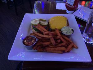 Vegan burger and fries at Mercury Bar West in New York City