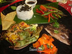 custom vegan plate:  pineapple tempeh in banana leaf, jerk portobello mushrooms, pickled carrots, veggies, wontons and rice at Kaya Island Eats in Key West