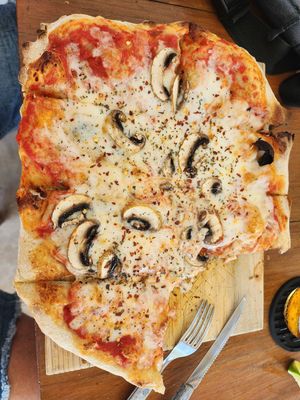 Vegetarian pizza mushroom and gorgonzola at Pizzeria La Pinsa in Holbox