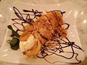 Delicious dessert! Fried pastry with coconut ice-cream inside. One of the best desserts I ever tried. at Araya's Place in Bellevue