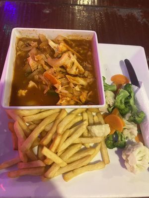 Veggies in tomato sauce (sauce was a bit too thin but with the rice it was ok)  at Swings Restaurant & Bar in San Pedro