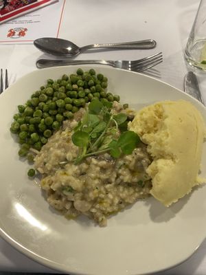 Mushroom risotto with mashed potato and peas  at Leyton Orient FC in East London