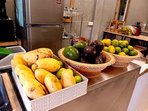Fresh fruits are shown on the desk at Air's Kitchen & Cafe in Chiang Mai