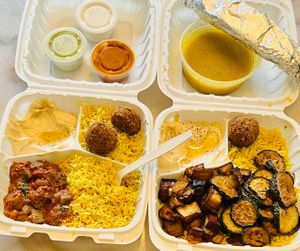Some kind of tomato based stew with okra.

Vegetarian plate with added Lentil Soup at Kismet Cafe in Austin