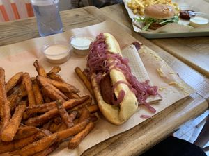 Hot and sweet Dog with sweet potato fries. Junior Cheese Burger in the back.  at Vbb House in Paris