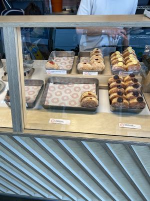 Vegan doughnuts in the back row on the left and in the middle  at Small Goods in Bristol