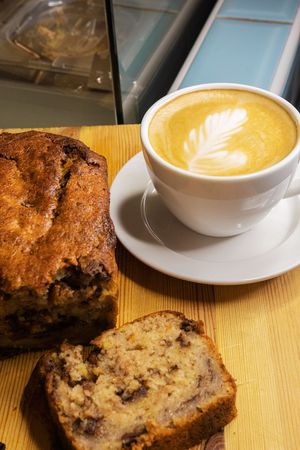 Our bestseller - BANANA BREAD & Coconut milk flat white  at Acai Poke in Prague