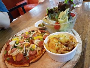Vegan yum pizza with hashbrown salad n olives at Bonita Cafe and Social Club in Bangkok