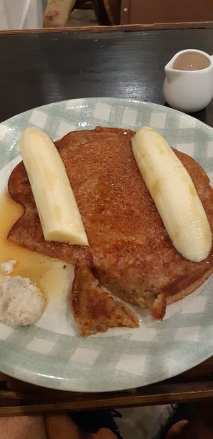 Pancakes with banana and coconut syrup. Who doesn't love pancakes..vegan pancakes !!  at Bonita Cafe and Social Club in Bangkok