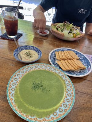 creamy spinach soup and crackers with vegan cream cheese at Bonita Cafe and Social Club in Bangkok
