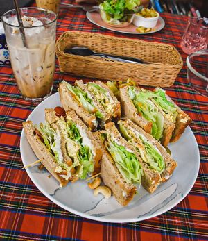 Club sandwich and iced soy milk latte  at Bonita Cafe and Social Club in Bangkok
