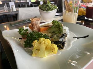 Spinach lasagne with salad   at Starlet Kempten in Kempten