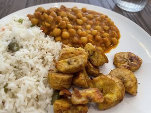 Coconut and vegetable rice with chickpea curry and roast plantain.  at MaRobert's in Edinburgh