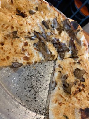 Make your own pizza, but vegan: with vegan cheez, mushrooms and garlic purée  at Bella Luna in Harrisonburg