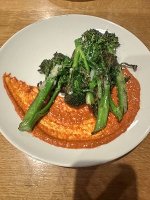 Seasonal Item - Broccolini  w/ vegan cheese + mojo sauce. This was also very amazing with tons of flavor.   at Bella Luna in Harrisonburg