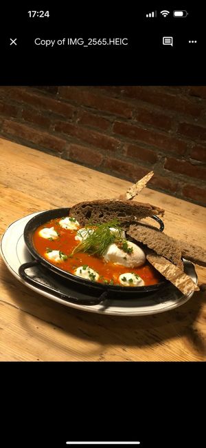 Shakshuka. Poached eggs in tomato, peppers, courgette onion goats cheese etc. 5 stars at GiGi von tapas in Barcelona