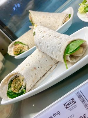 Vegetable roll: roll with plant based sausage, hummus, pickle, fried onion and mustard at IKEA in Oviedo