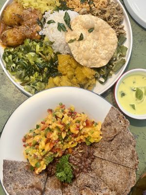 Sri Lankan curry (top) and red bean curry and mango salsa with finger millet roti (bottom)  at The White Rabbit  in Ella
