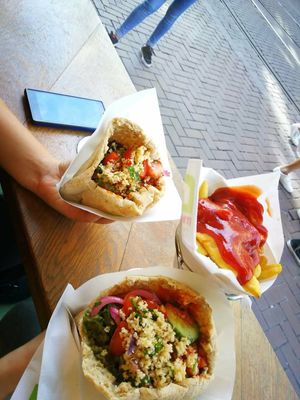 I'm not sure how much it was, I think the falafel was about 4€ at Maoz - Muntplein in Amsterdam