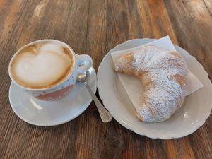 Cappuccino with soy milk and vegan croissant at Al Barco in Vicenza