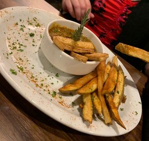 The newly developed appetizer is coming on the menu soon! It was a Pea Gravy with Tofu Sticks and Fries.  at J's International Grill in Richardson