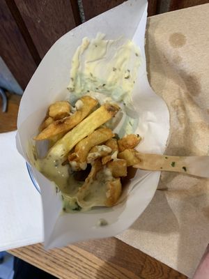 Half-eaten fried  at Maoz - Leidsestraat in Amsterdam