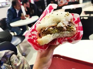 Sushi burger with veggie patty and coleslaw at Sarku Japan  in Bogota