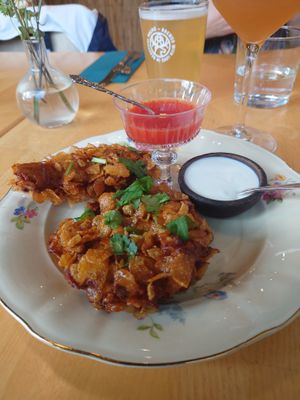 ROYAL PAKORA - Fried oyster wedges with paprika and tomato chutney and lime yoghurt. at Manto in Malmo