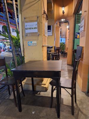 Outdoor seating area at Geographer Cafe in Malacca