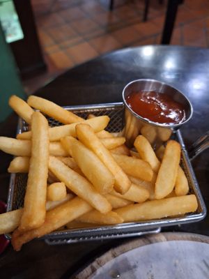 French fries with spicy ketchup at Geographer Cafe in Malacca