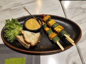 Temphe zuchini sticks with peanut sauce at Pranaa Food For Life in Bangkok
